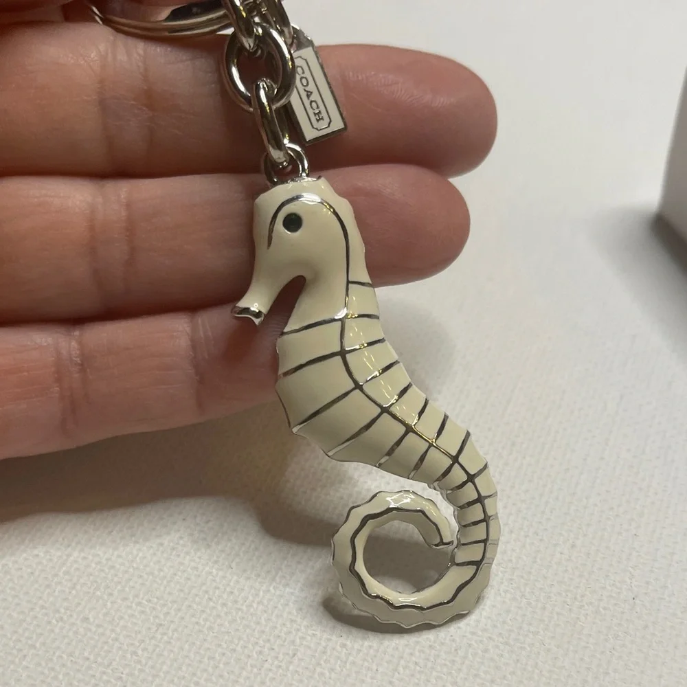 Coach White Seahorse Keychain and White Coach Pen